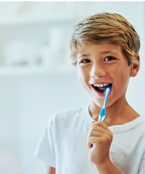 boy brushing teeth